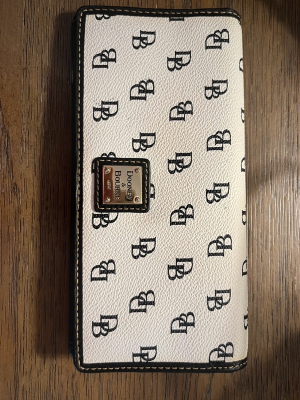 Dooney & Bourke Slim Continental Wallet.  Gretta Collection/White Coated Canvas
